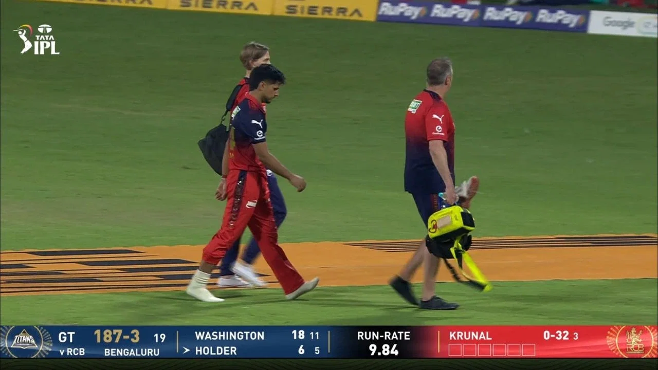 Rasikh Dar RULED OUT? RCB pacer sustains a hamstring injury vs GT in IPL 2026